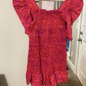 Olivaceous brand pink and orange printed ruched mini dress with ruffle trim hem